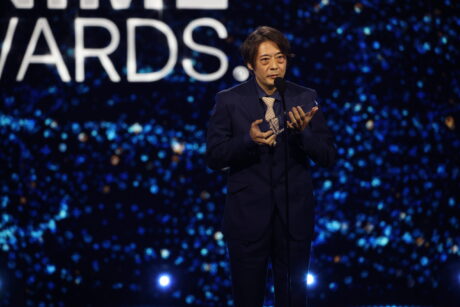 "Solo: Leveling," "Dan Da Dan," And More Celebrate Wins From 2025 Anime Awards 23 Global Impact Award accepted by Yuichiro Hayashi presented by Damiano David scaled e1748555652770